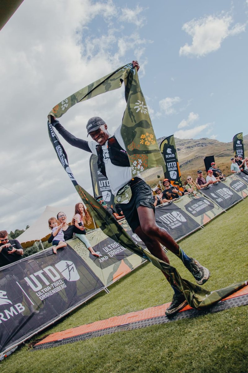 Thato Kabili crossing the finish line at the Ultra-Trail Drakensberg race